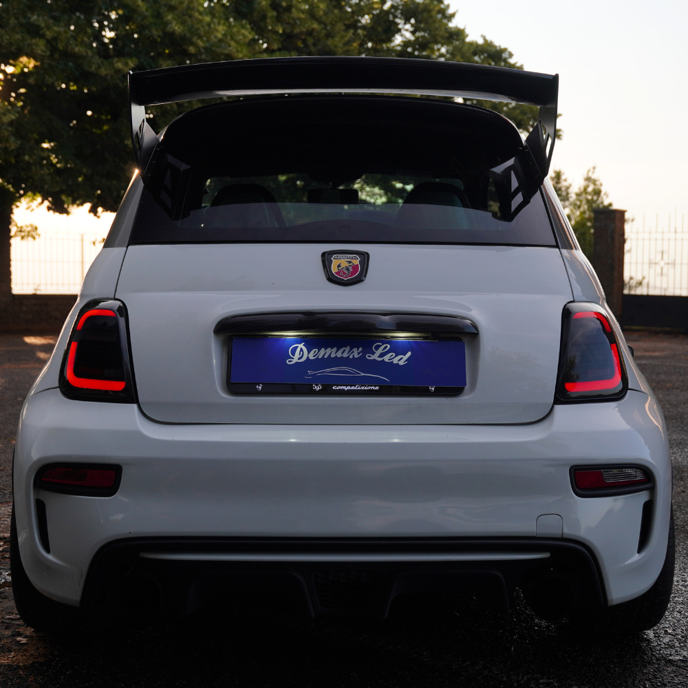 Fiat 500 Abarth with DEMAX Series 2 Full LED tail lights illuminated at sunset | Fiat 500 Abarth avec feux arrière Full LED DEMAX Série 2 allumés au coucher du soleil